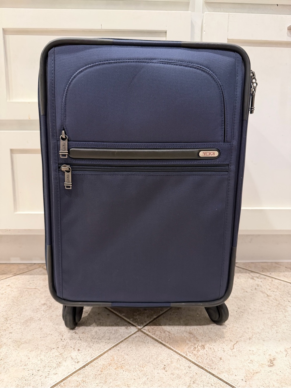 Tumi Navy Softside Carry-On Spinner